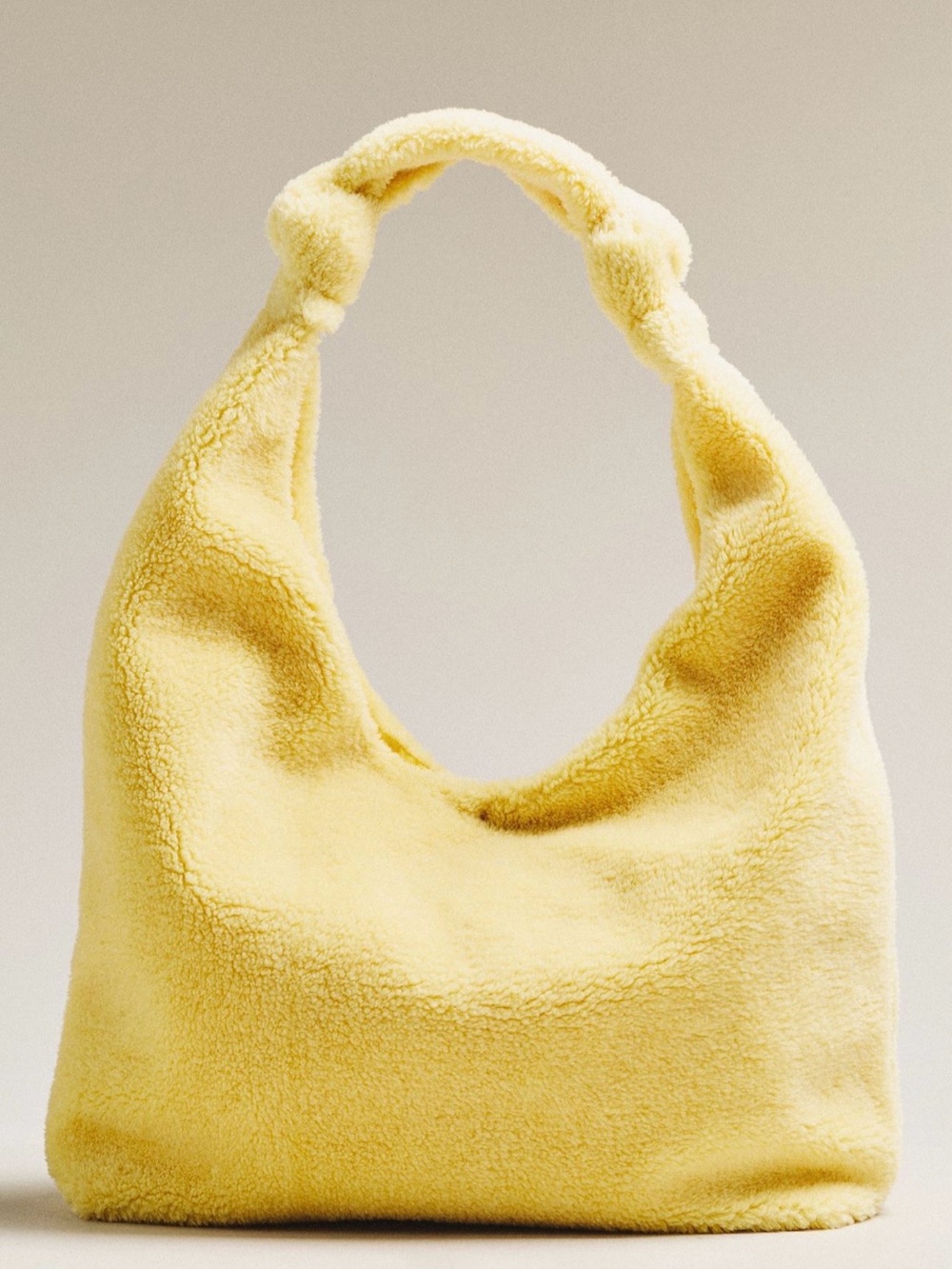Anthropologie Love Knot Slouchy Bag Sherpa Fleece Edition in Light Yellow NWT